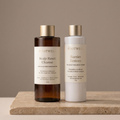 RootWellHair Complete System shampoo and conditioner bottles, featuring sleek packaging and product labels.
