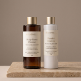 RootWellHair Complete System shampoo and conditioner bottles, featuring sleek packaging and product labels.