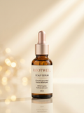 RootWellHair 30-Day Serum bottle with dropper, showing clear liquid and sleek packaging for hair and scalp revitalization.